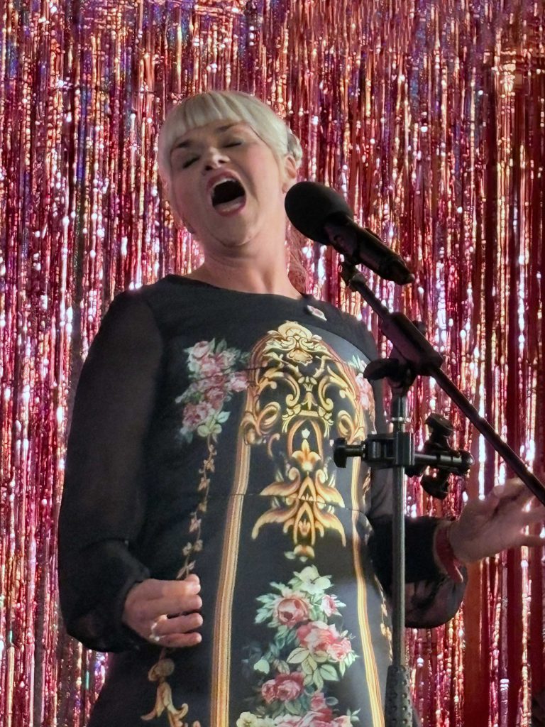 Marj Hogarth singing at Keith's 60th Birthday party at their Capel Salem home